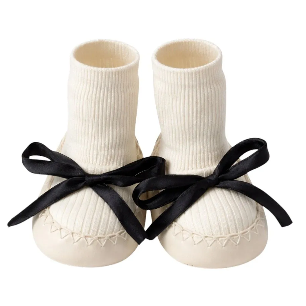 Ribbed Knit Soft Sole Booties With Accented Black Bow - Cream
