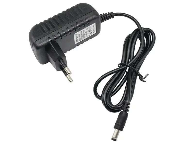 Plug & Play 9V 2A DC Adapter: Compact Design for 5.5x2.5mm Devices